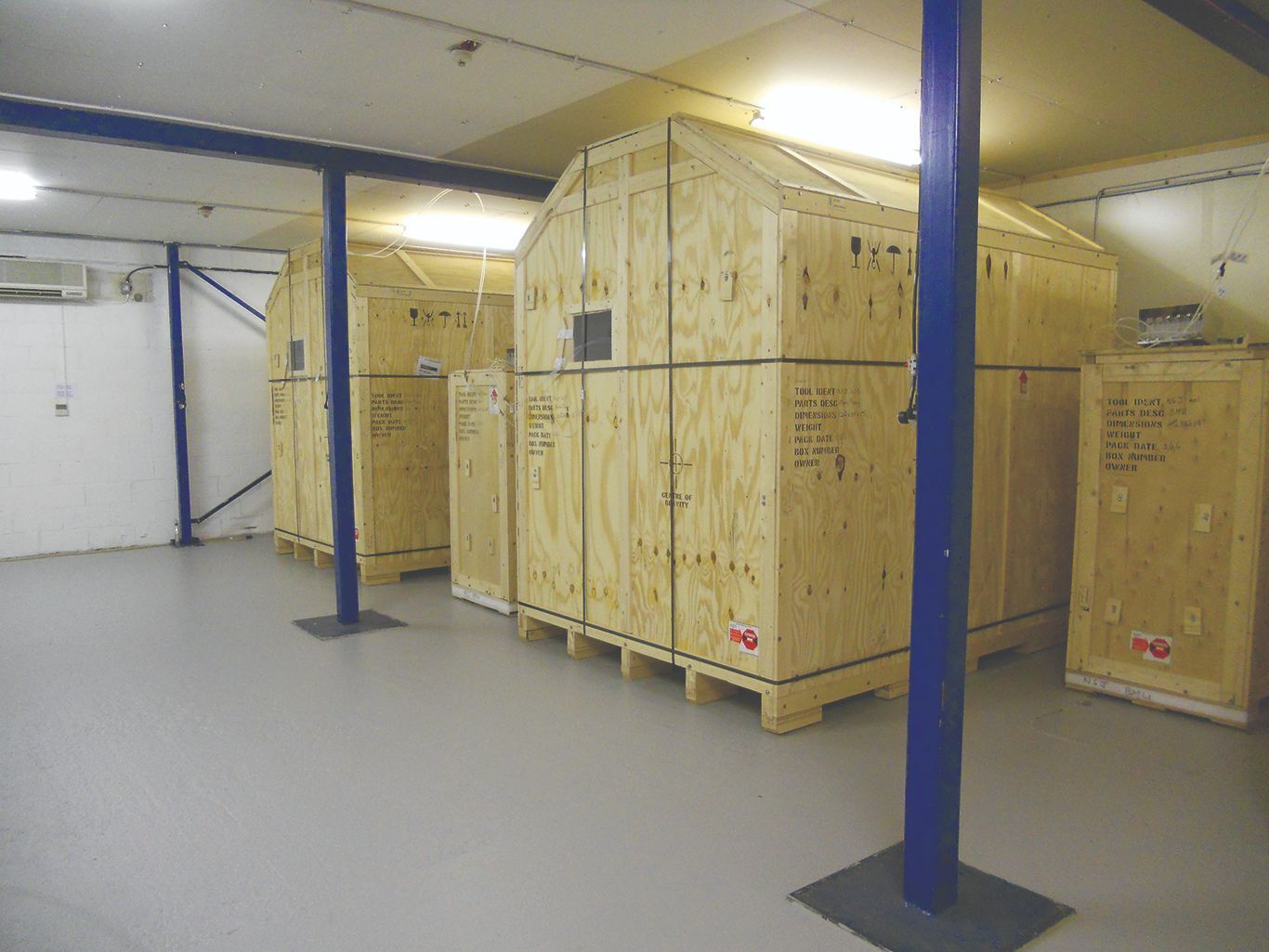 Large wooden containers in our secure storage facility