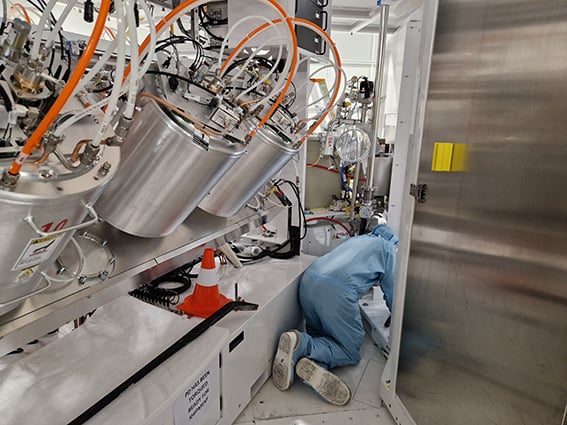 Field service engineer installing an ion implanter